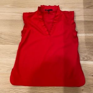 Maje bright red sleeveless blouse. Coordinates with black trousers I'm selling.